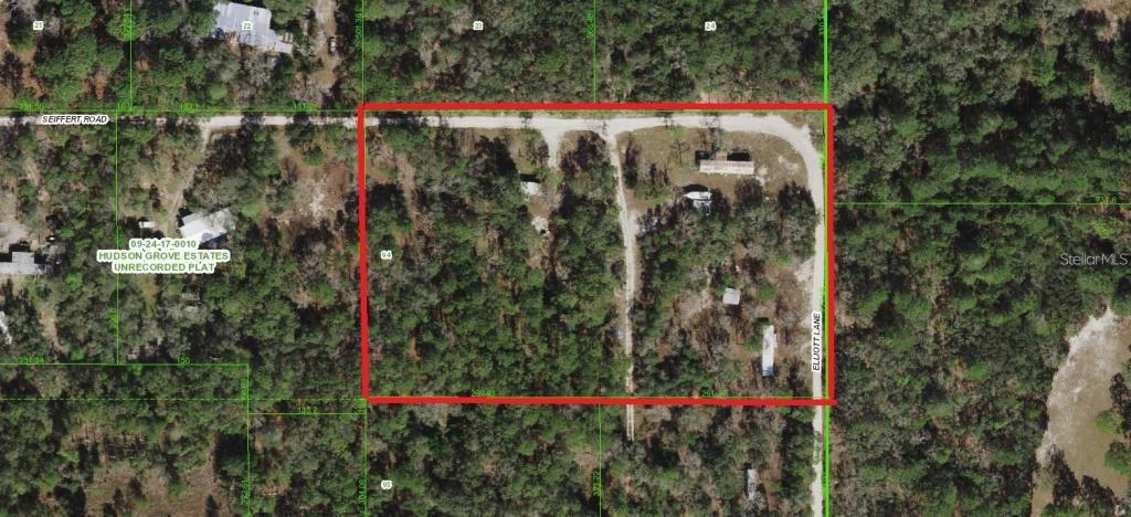 12122 Seiffert Road, Hudson FL, 3.99 acres zoned AR with four mobile homes