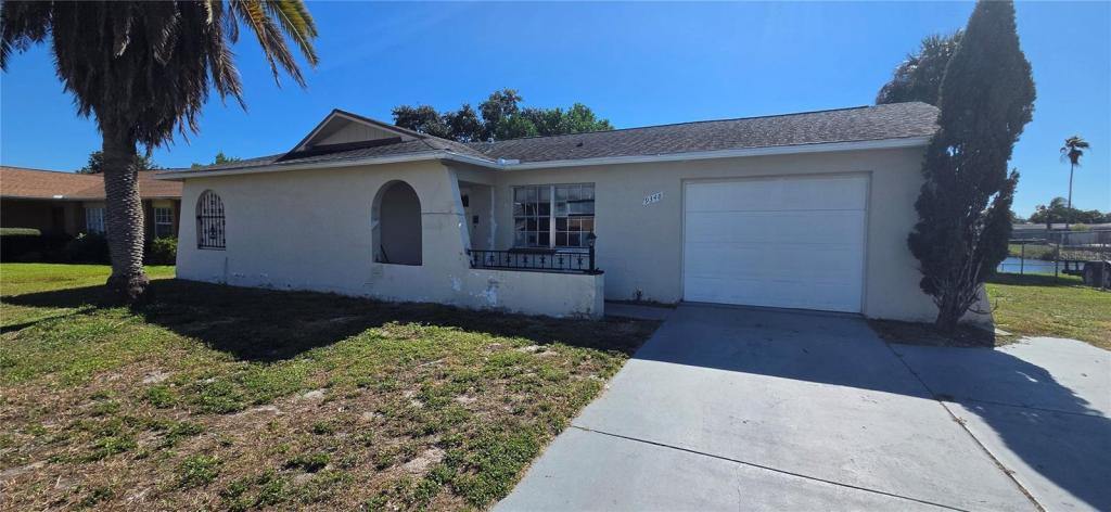 9348 Lake Christina Lane, Port Richey FL, lakefront pool home needing structural renovation